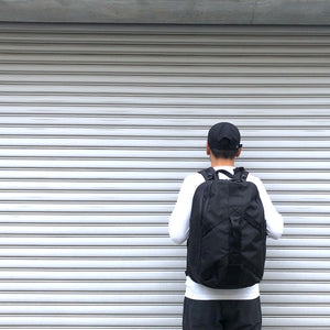 -〔UNISEX〕- WHITE MOUNTAINEERING BLK ホワイトマウンテニアリング 　　 WM × BRIEFING BACK PACK　